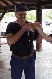 Picture of Dewayne pulling silly string off his shirt