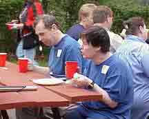 Picture of Larry and Sharron eating at the picnic table