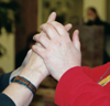 two people communicating in tactile sign language